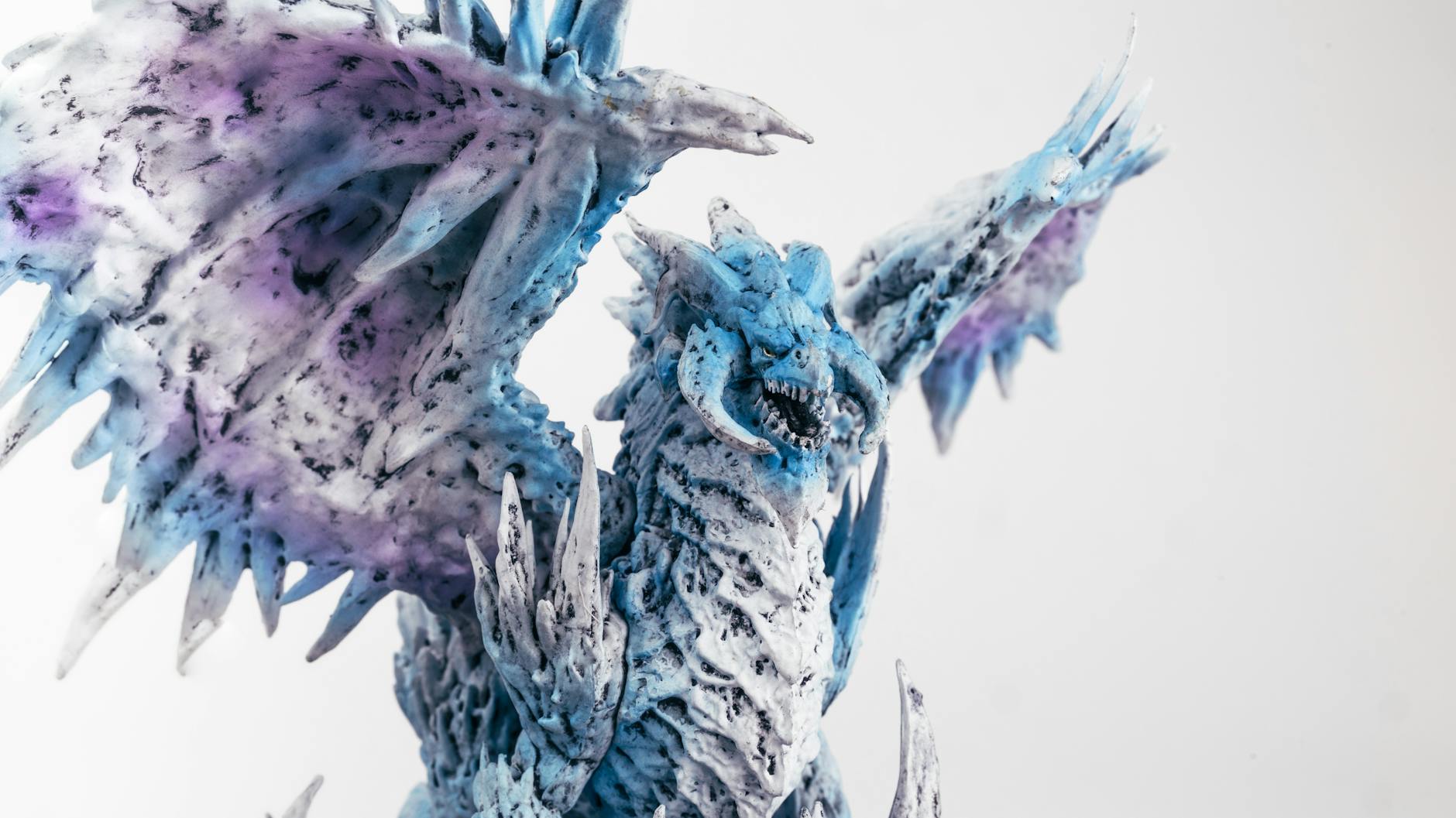 blue and purple dragon figurine